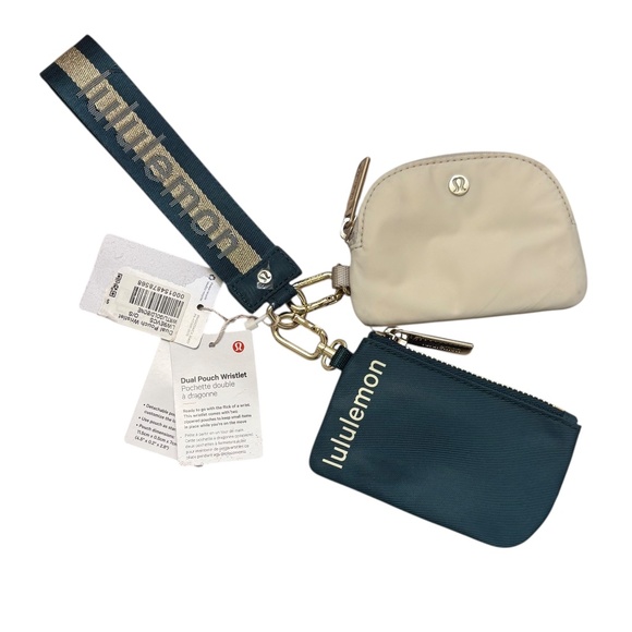 lululemon athletica Handbags - Lululemon Dual Pouch Wristlet new nwt in Warp Teal/Gold/Bone